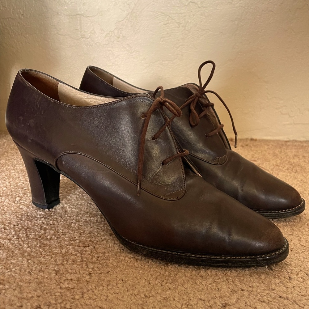 Lace up mid heel bootie.